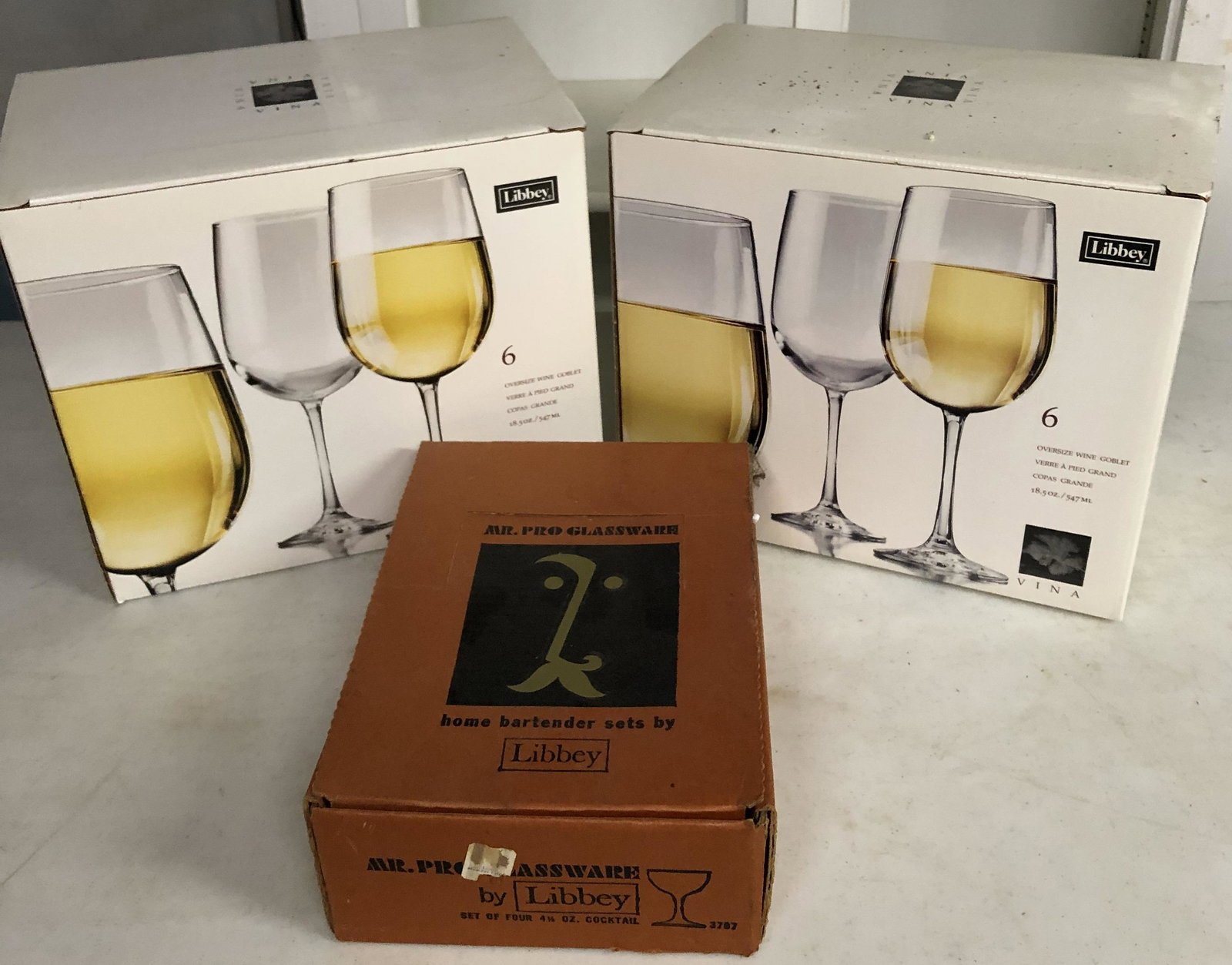 New in box Stemware by Libby: 4 cocktail quality glasses, 12 oversize wine glasses