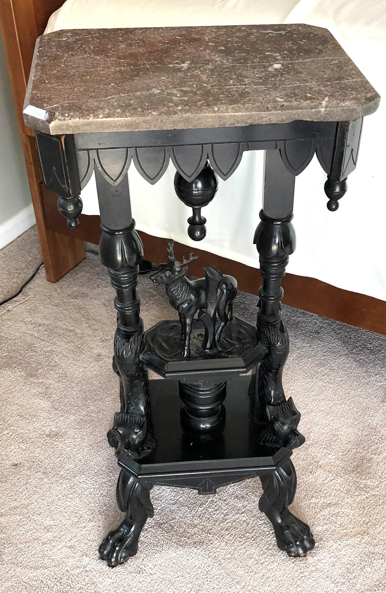 Antique Marble Top Plant /Lamp Stand with Stag Carving: This has the original black finish and a few issues (see photos) It measures 34" tall x 16" x 11-1/2". Shipping will be available via UPS Store, marble separate from base.