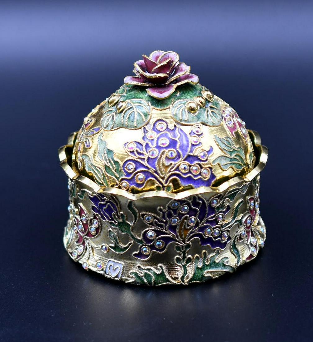 Jasmine Dresser Jar w/Swarovski Crystals: This is hand laced with gold according to the literature and highlighted with Swarovski crystals, it's 3-1/2" diameter & 3-1/2" high, and weighs 7.15 oz.