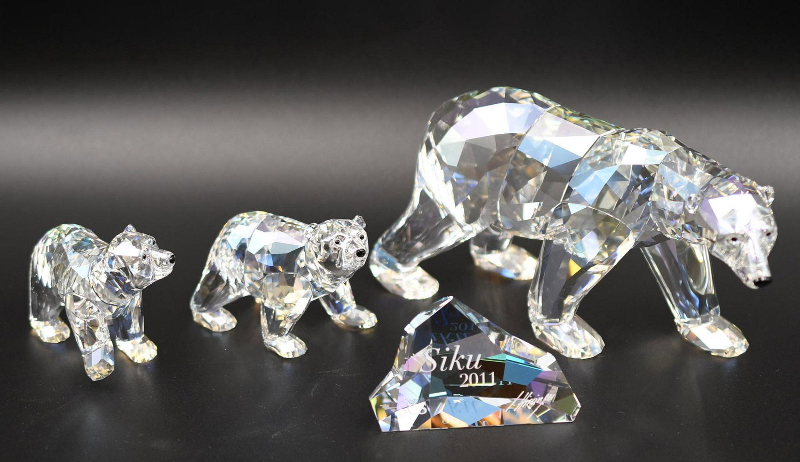 Swarovski Siku Polar Bear Family: adult is 3-1/4" tall x 7" long, cubs are 2" tall, weighs 2lb 3.5oz