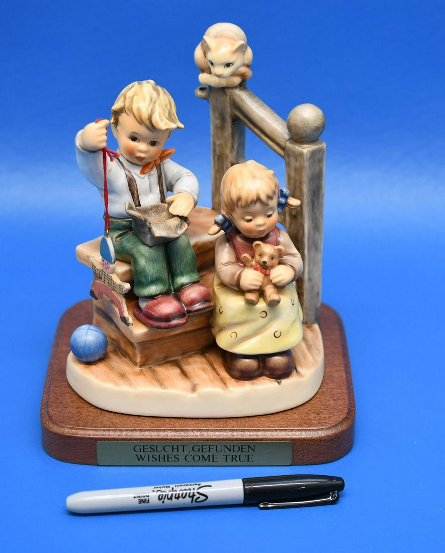 Hummel "Wishes Come True": Exclusive Edition 2000/2002, Wonder of Childhood. Measures 7" tall plus tand x 5-5/8" wide x 4-5/8" deep, and weighs 2 lbs 2 oz