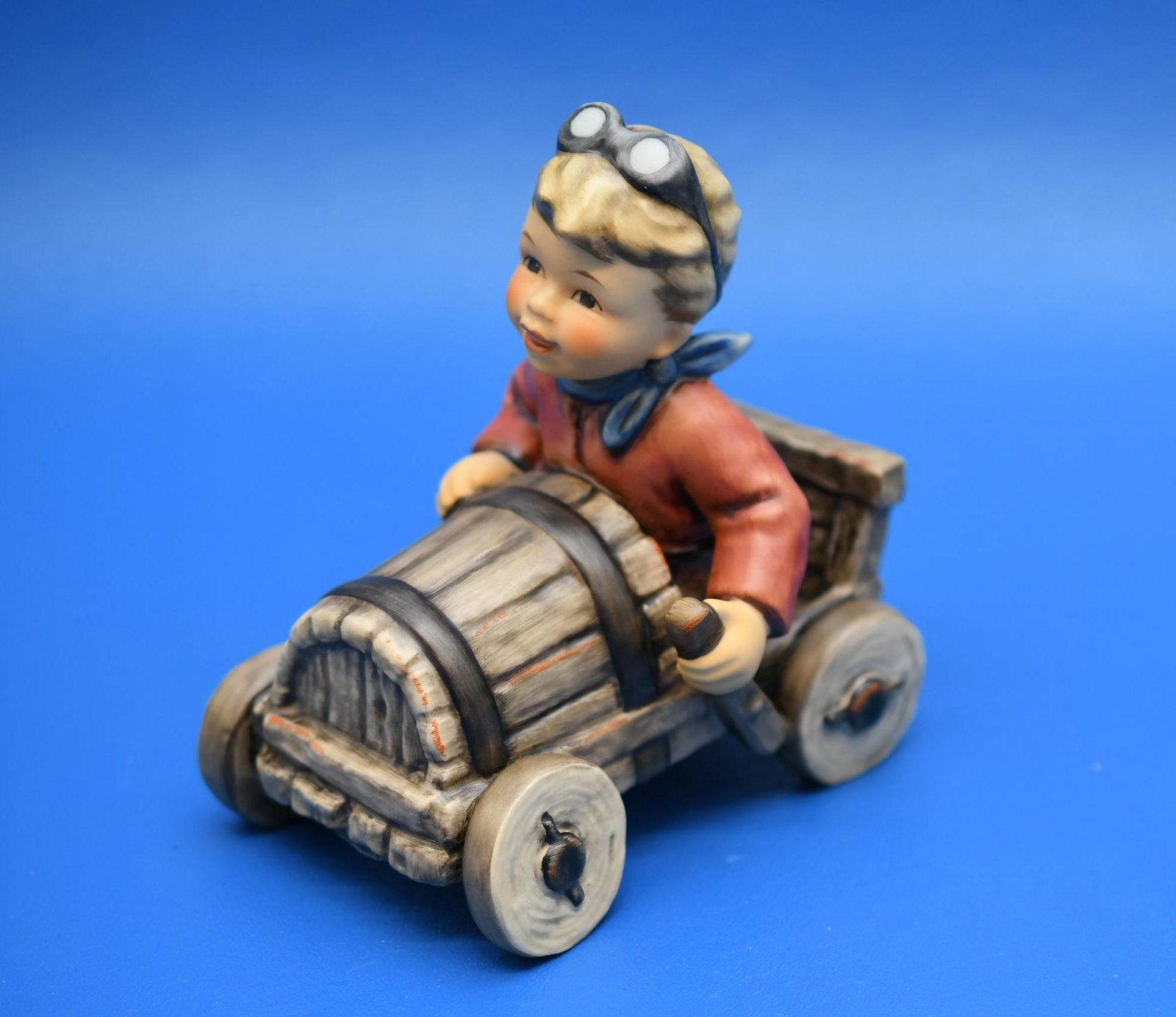 Hummel "Racer": Marked Original Hummel, measures 5" tall x 4-1/2" long and weighs 9 oz