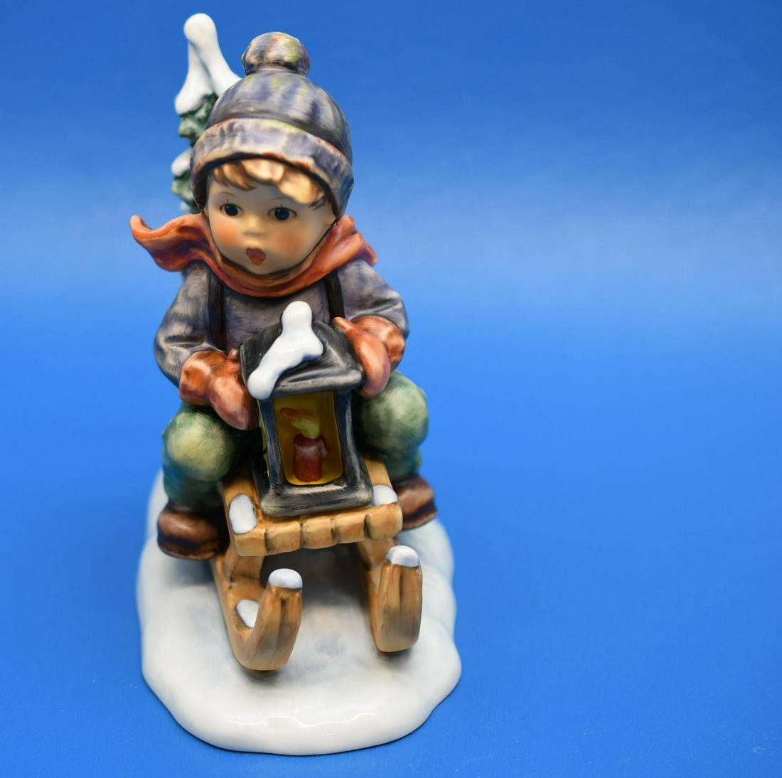 Hummel "Ride Into Christmas": no 396/I, measures 5-7/8" tall x 5-3/8" long, and weighs 15 oz