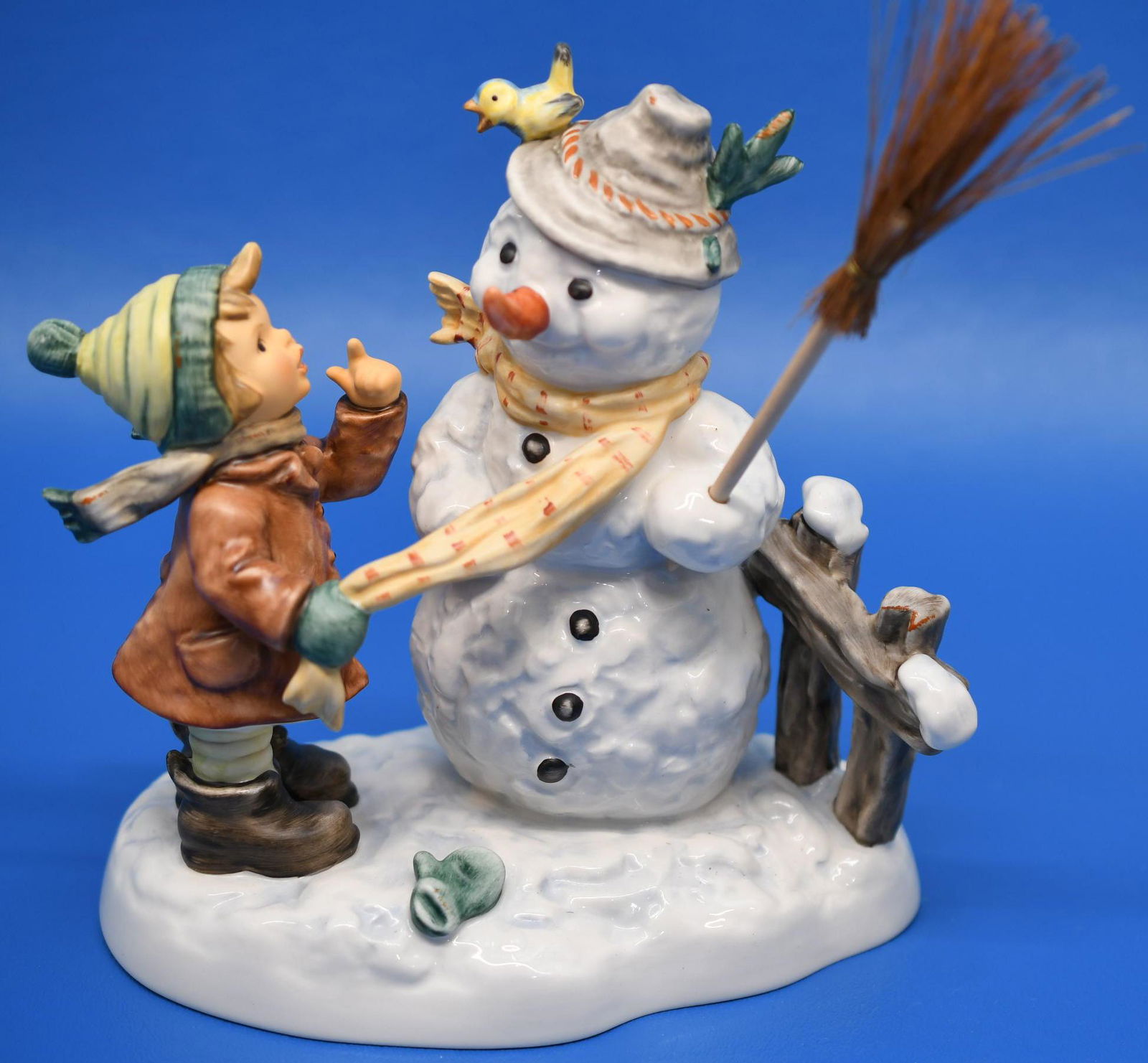 Hummel "Winter Friend": First Issue 2008, measures 7" tall plus broom x 6-3/8" wide, and weighs 1 lb 2 oz
