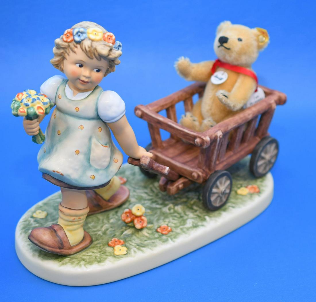 Hummel "Tag Along Teddy"Steiff: This is a Limited Edition Steiff Original Hummel No. 169 of 499, Includes a jointed classic blond Steiff 5" Teddy No.169 measures 8" tall x 10-1/4" long, and weighs 2 lbs 12 oz