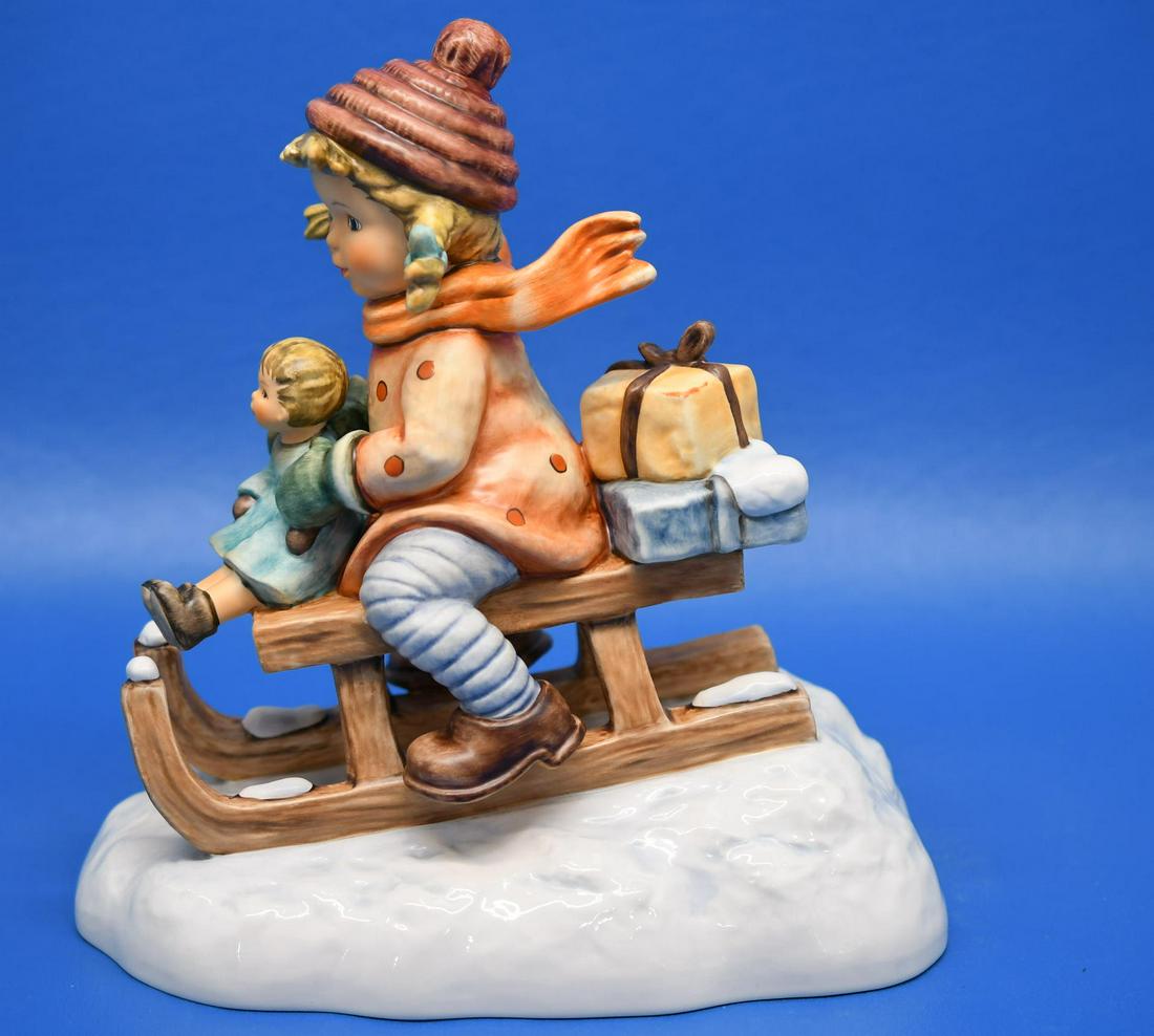 Hummel "Christmas Delivery": 2004 First Issue, measures 9" tall x 8-1/4" wide, this includes the original box & foam packaging which measures 13"x 15-1/4"x 11-1/2", total weight is 5 lbs
