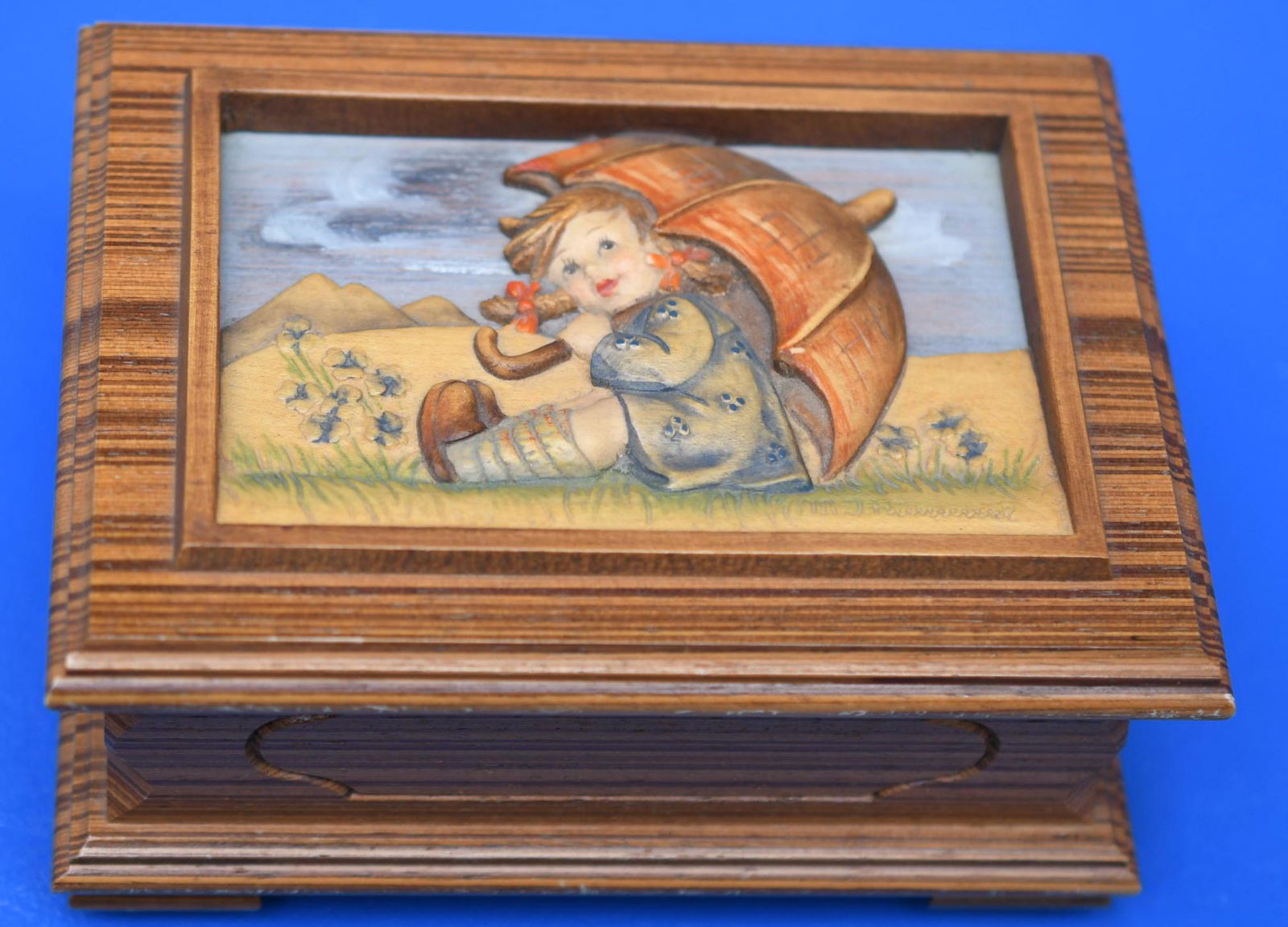 Goebel Hummel "Anri" Four Seasons Series Swiss Music: Anri made this wonderful wood body 1989 Fourth Edition in a series of Four Italian Music Box that plays "Rain Drops Keep Falling On My Head" this is No. 00346 of 10,000 of a limited edition. Measures