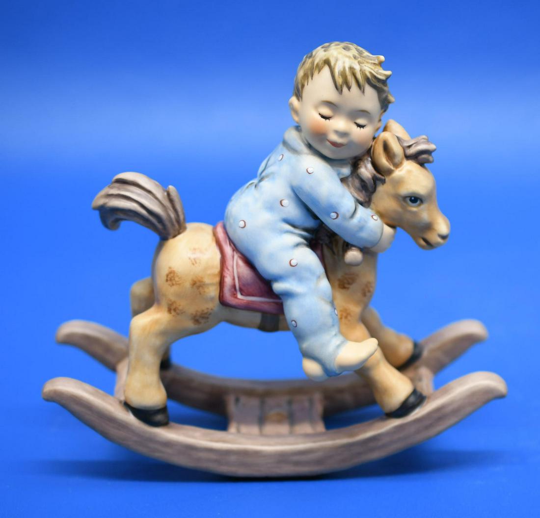 Hummel "Sweet Dreams": Hummel No 2050. I'm confused on this ones number and name but this is what I found when I searched. It is 5-1/2" tall, and weighs 9 oz