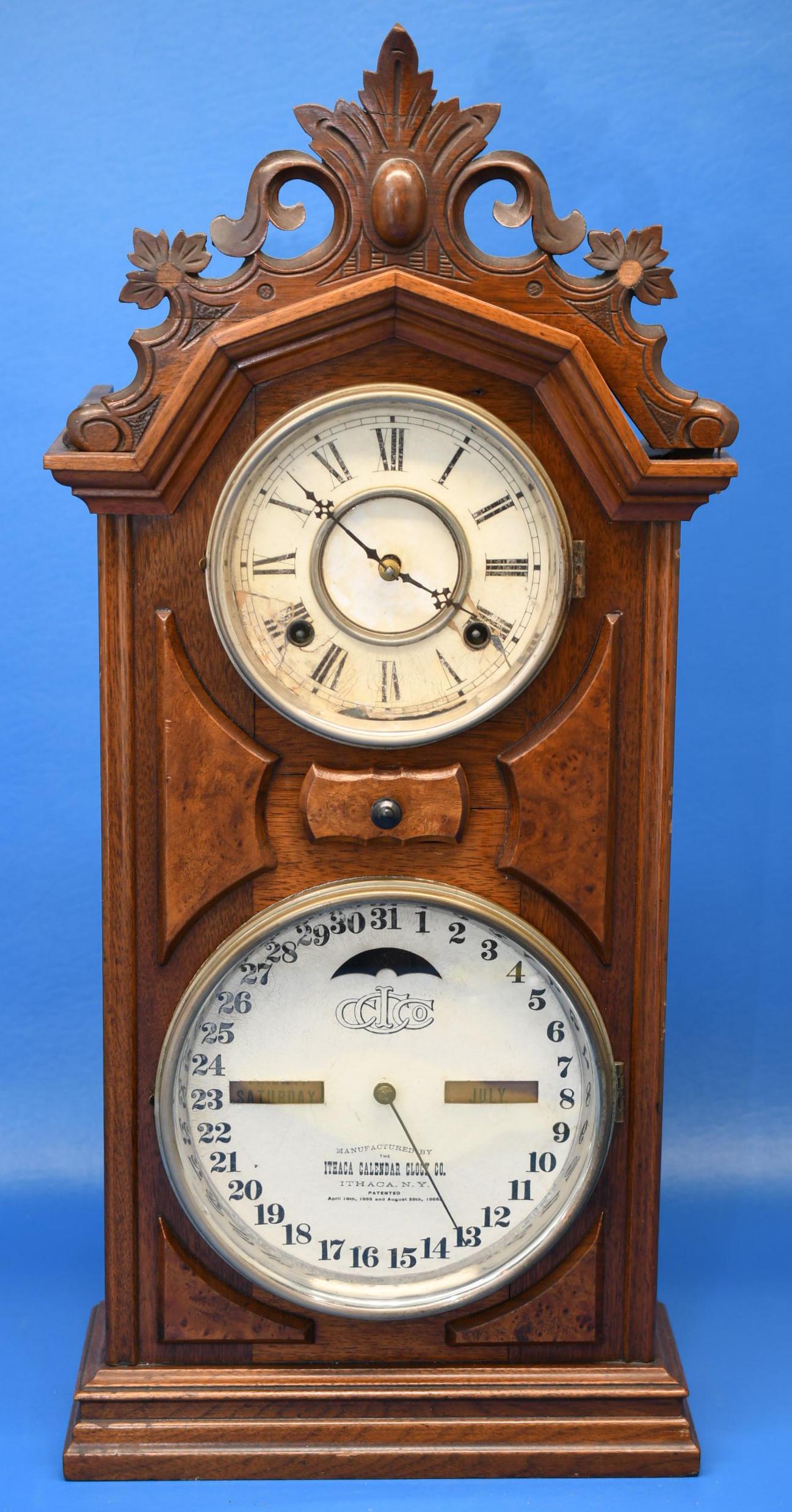 Ithaca Double Dial Perpetual Calendar Mantle Clock: Walnut case, and Appears to working as it should nut we are not clock experts so no guarantee. Inside was a receipt for $1100.00 with a 1 year warranty dated in 2013. 26-1/2" tall x 12" wide at base a