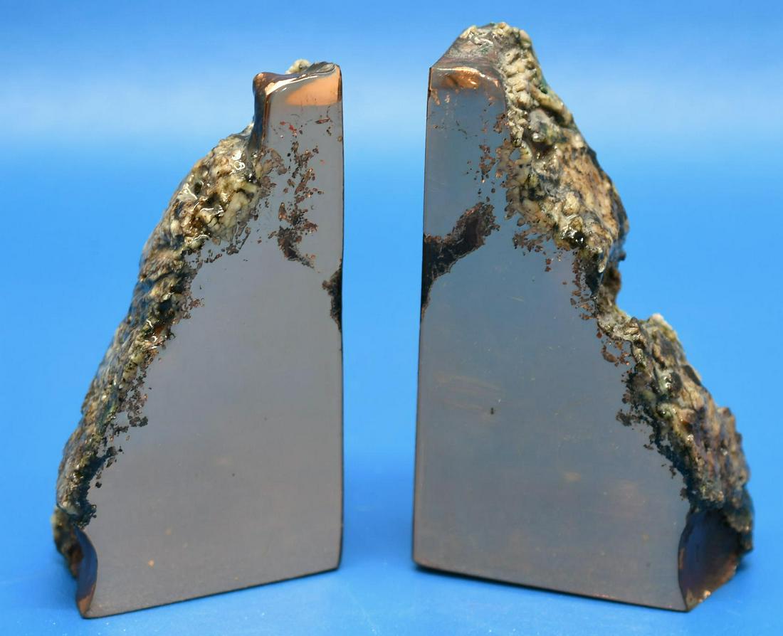 Float Copper Bookends: polished on 1 side, and 5-5/8" & 5-7/8" tall x 3" & 3-1/2" wide x 1-1/2" thick, and weigh 9 lbs 10 oz