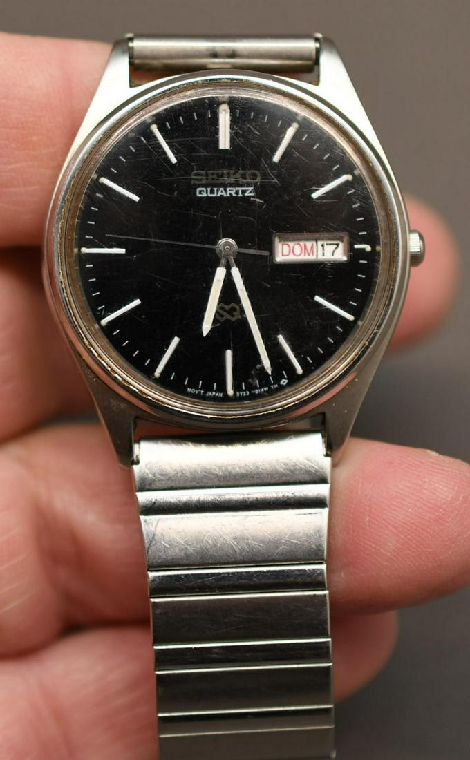 Three Seiko Quartz Men's Wrist Watches: None are running or have been tested 1. black dial watch stainless steel and water resistant speidell band 2. Patterned white dial with leather band base metal w/stainless steel back water resistant b
