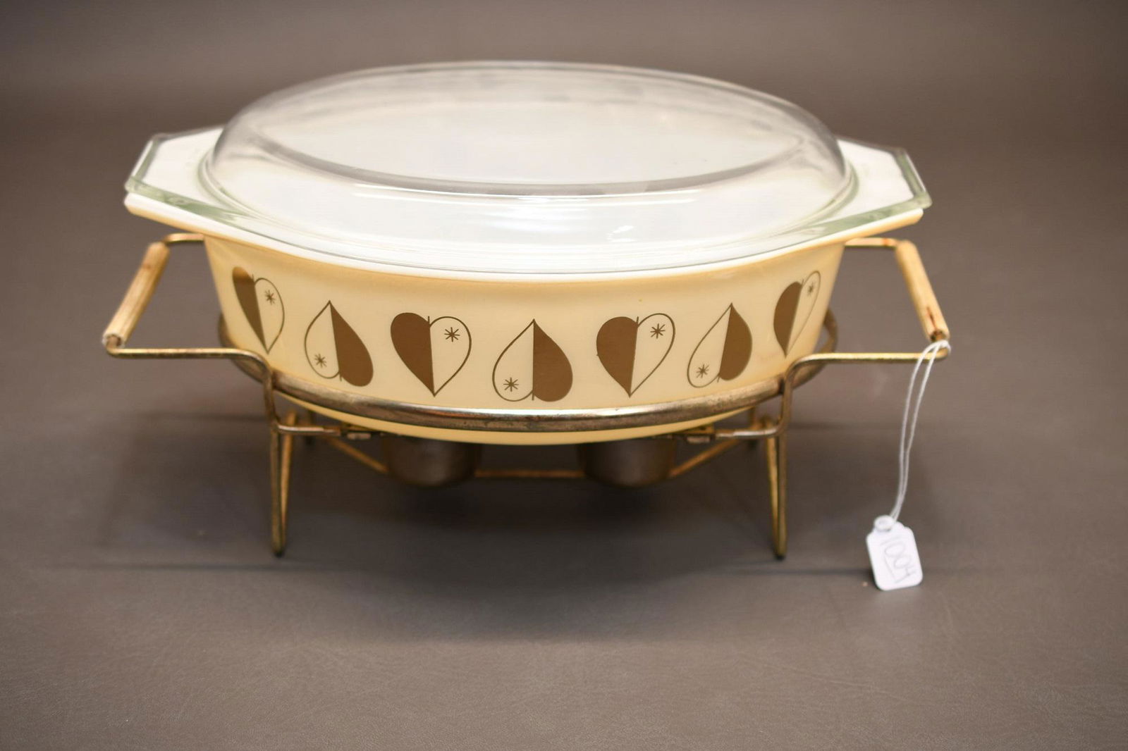 Pyrex Baking Dish with Metal Stand: Baking dish is 13" long x 8-1/2" , metal rack is 13-5/8" long and has two candle burners, approximate total weight is 5lb 8oz