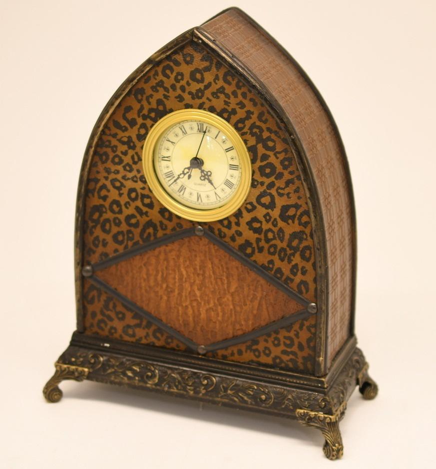 Quartz Mantle Clock: This has no makers name, but this works & has a wood frame with a composite face, and takes a AA Battery not included. 12-1/2" tall x 10" wide x 4-3/4" deep at base, it weighs 2 lbs