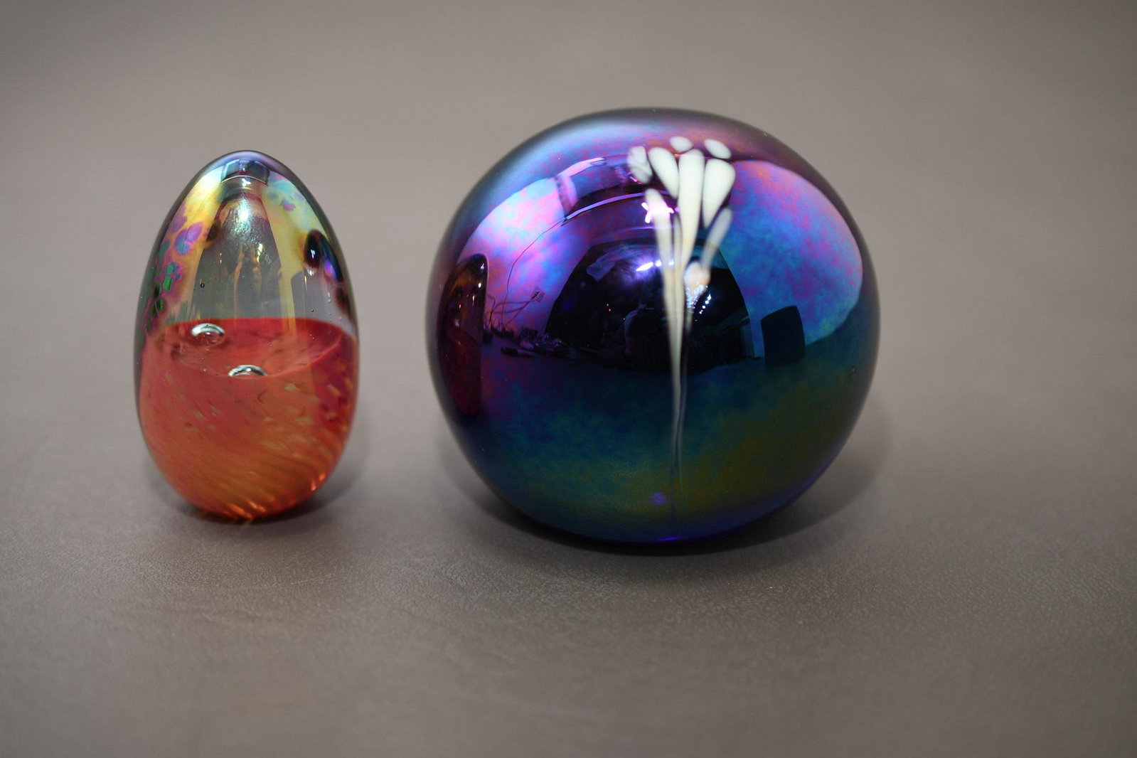 Two Signed "MSH"Art Glass Paper Weights: egg measures 2-1/2" tall x 1-1/4" diameter, round one measures 2-3/4" tall x 3" diameter, approximate total weight 1lb 9oz
