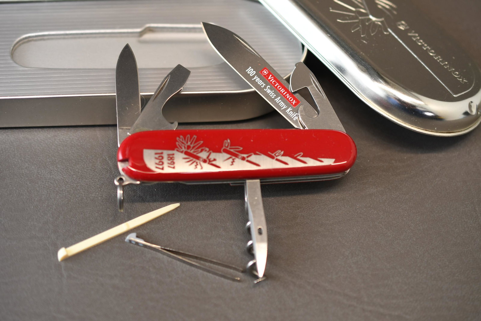 Victorinox Swiss Army Knife: 100 Year Anniversary Officer's Knife, Original Tin Case and Packaging, approximate total weight 9oz
