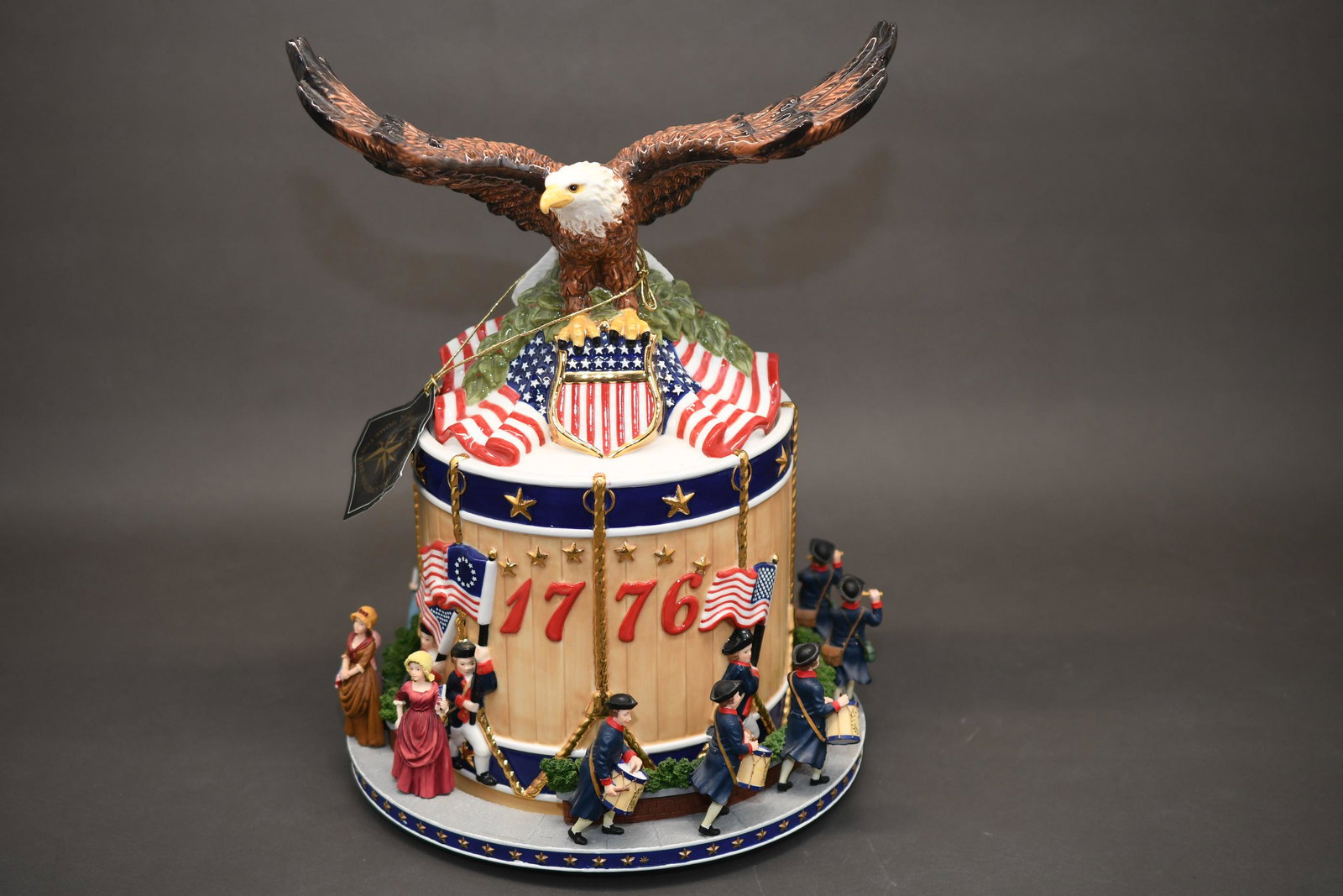 Christopher Radko Centennial Musical Cookie Jar: Ceramic jar figures are composite, Plays "Star Spangled Banner", Hand Painted Surface, 16" tall, wings are 11-1/4" across, approximate weight 7lb 10oz