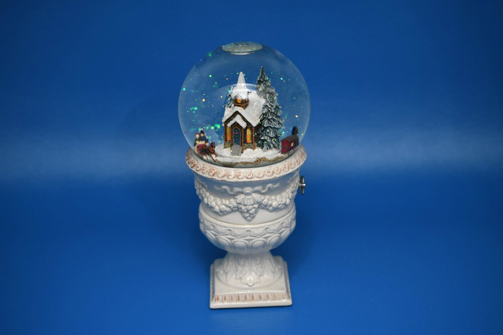 San Francisco Music Box Company Snow globe: Plays "silver bells" animated carriage scene, 10" tall x 4" diameter, approximate weight 3lb 2oz