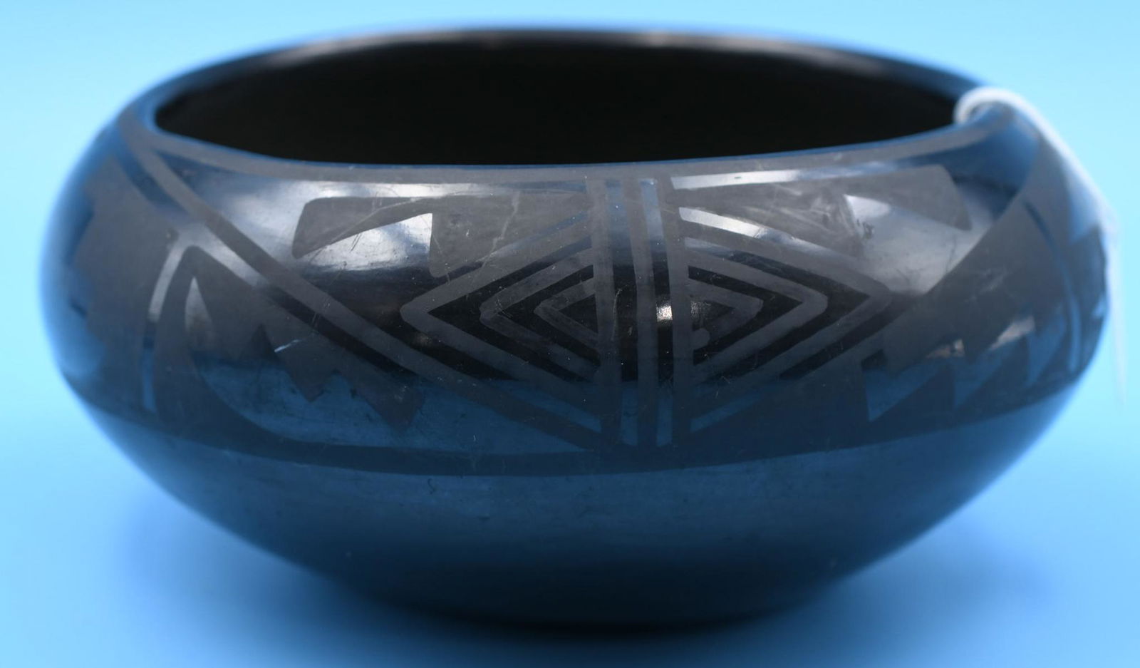 San Ildefonso pottery, Bowl, Black on Black, Rosalie and Joe Aguilar: 3-1/4 inches tall with 6-1/2 inch diameter. Hand coiled