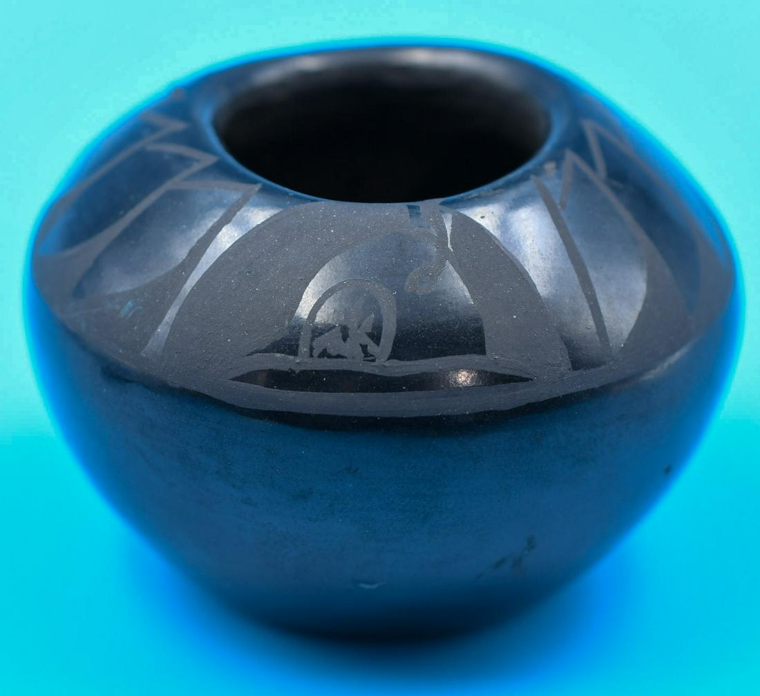 San Ildefonso pottery, Bowl, Black on Black, Alfred Aguilar: 1-3/4 inches tall with 2-5/8 inch diameter. Hand coiled