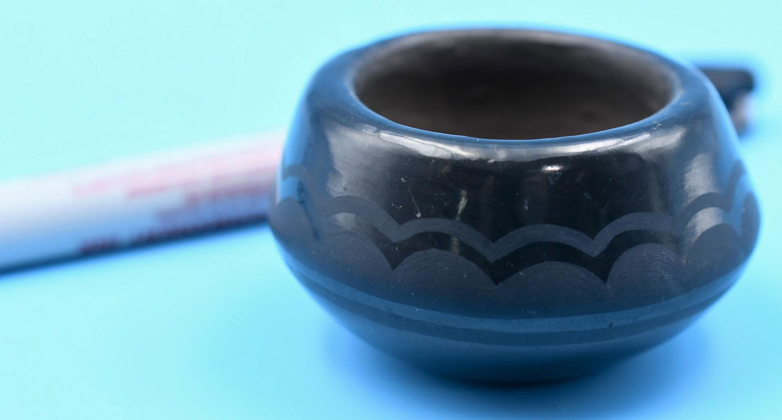 San Ildefonso pottery, Small Bowl, Black on Black, Blue Corn (Crucita Gonzalez): 1-3/8 inches tall with 2-1/4 inch diameter. Hand coiled