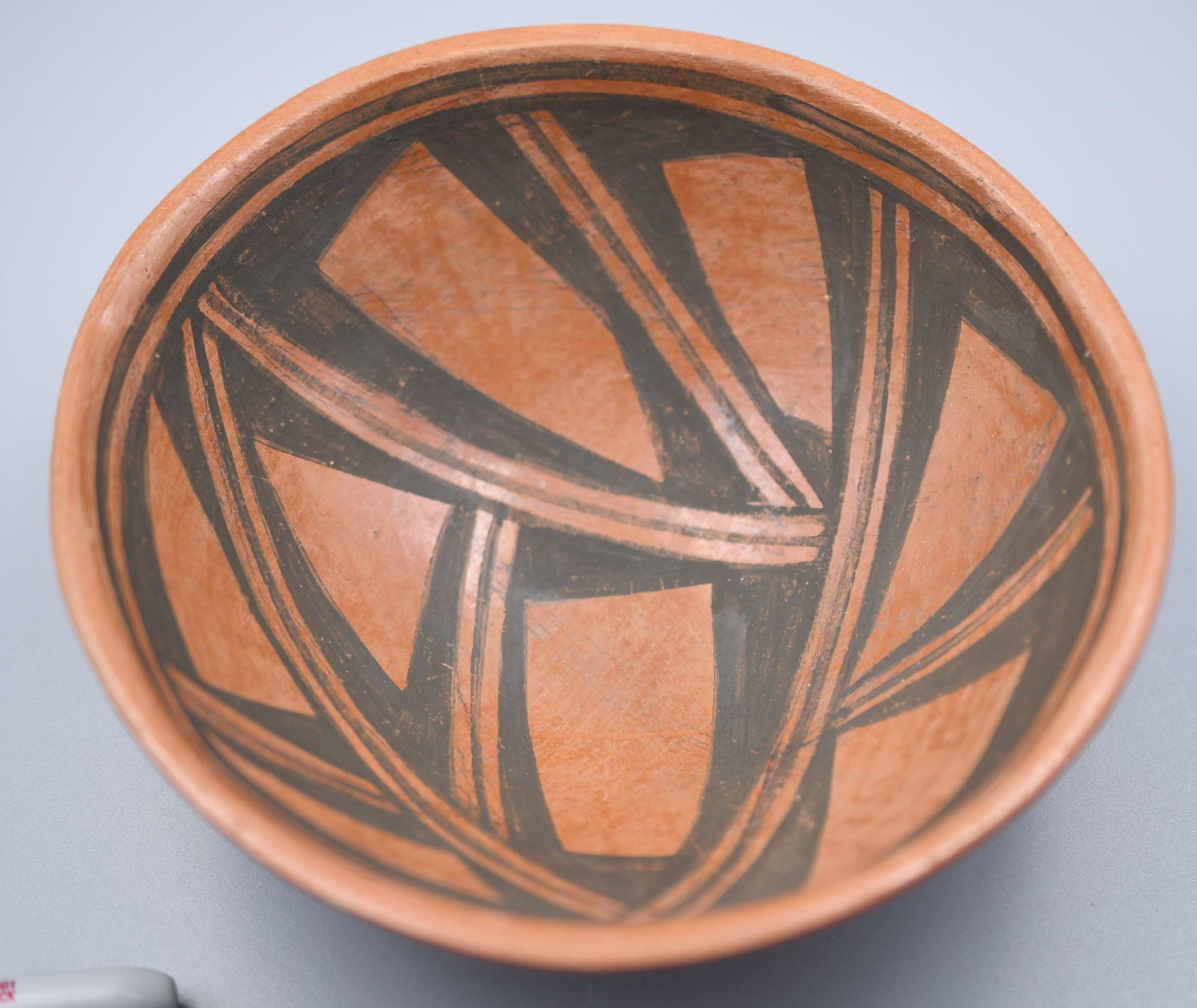 Tesuque, Black on Redware Bowl, Ka-We?, (~1900?): 2-3/8 inches tall with 6-1/2 inch diameter