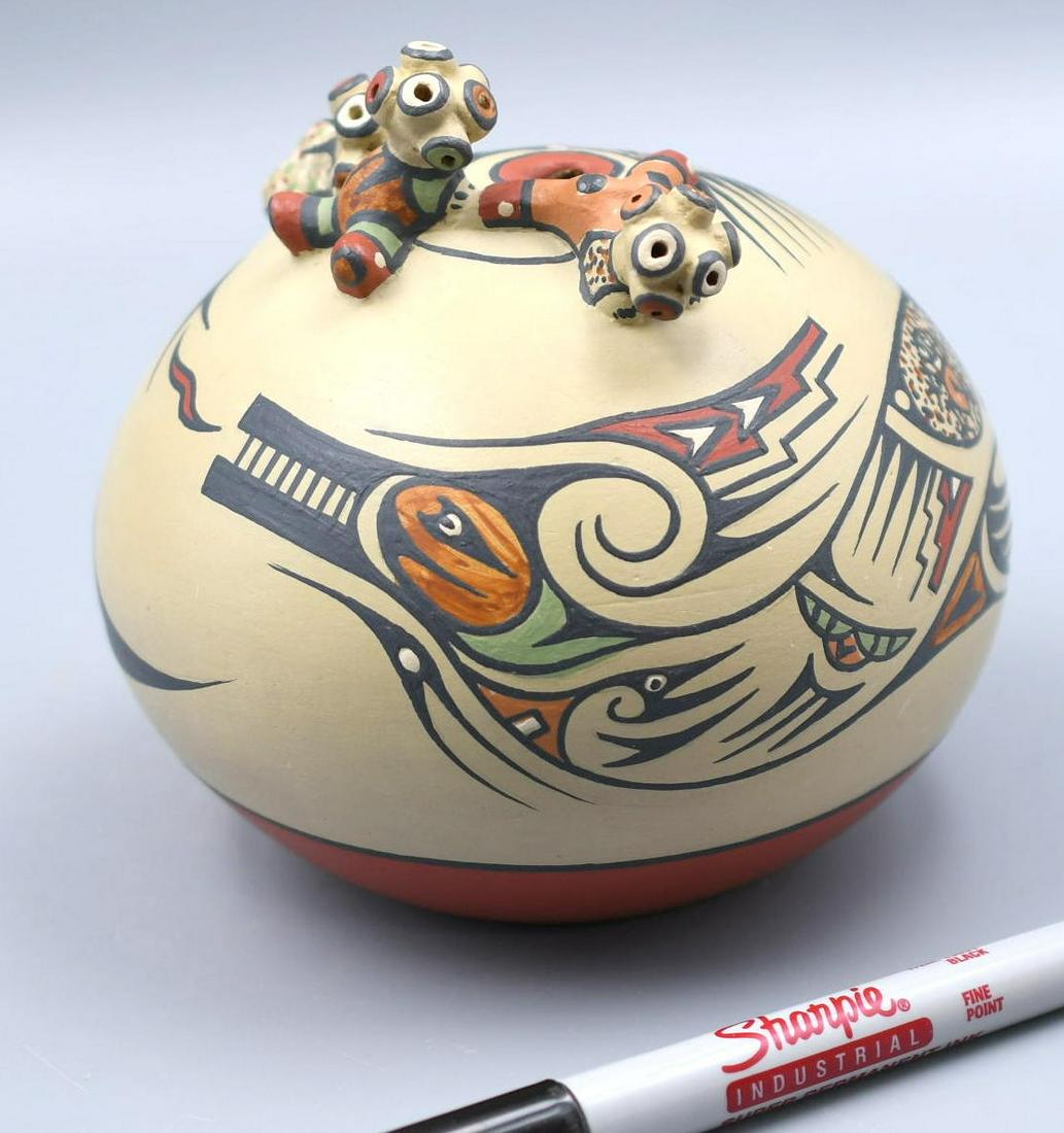 Santa Clara Pueblo, Seedpot with Clowns and Avanyu, Margaret Gutierrez: 5 inches tall with 5 inch diameter