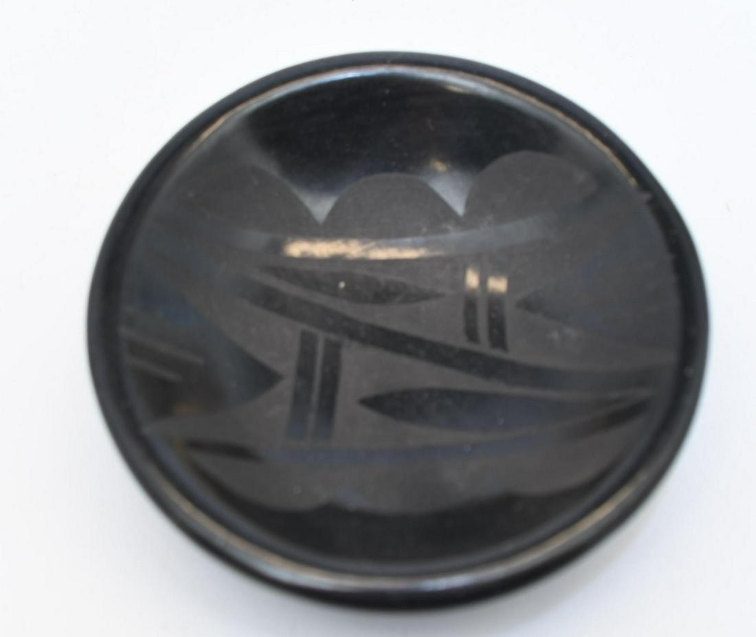 San Ildefonso, Black on Black Plate, faint signature (indecipherable): 1-1/4 inches tall with 4-1/2 inch diameter