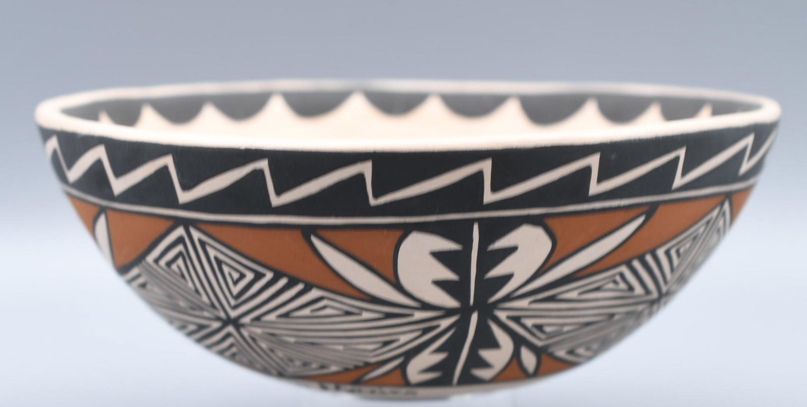 Acoma, Two Lizards Bowl, Caroline Lucario: 2-1/2 inches tall with 6-1/2 inch diameter