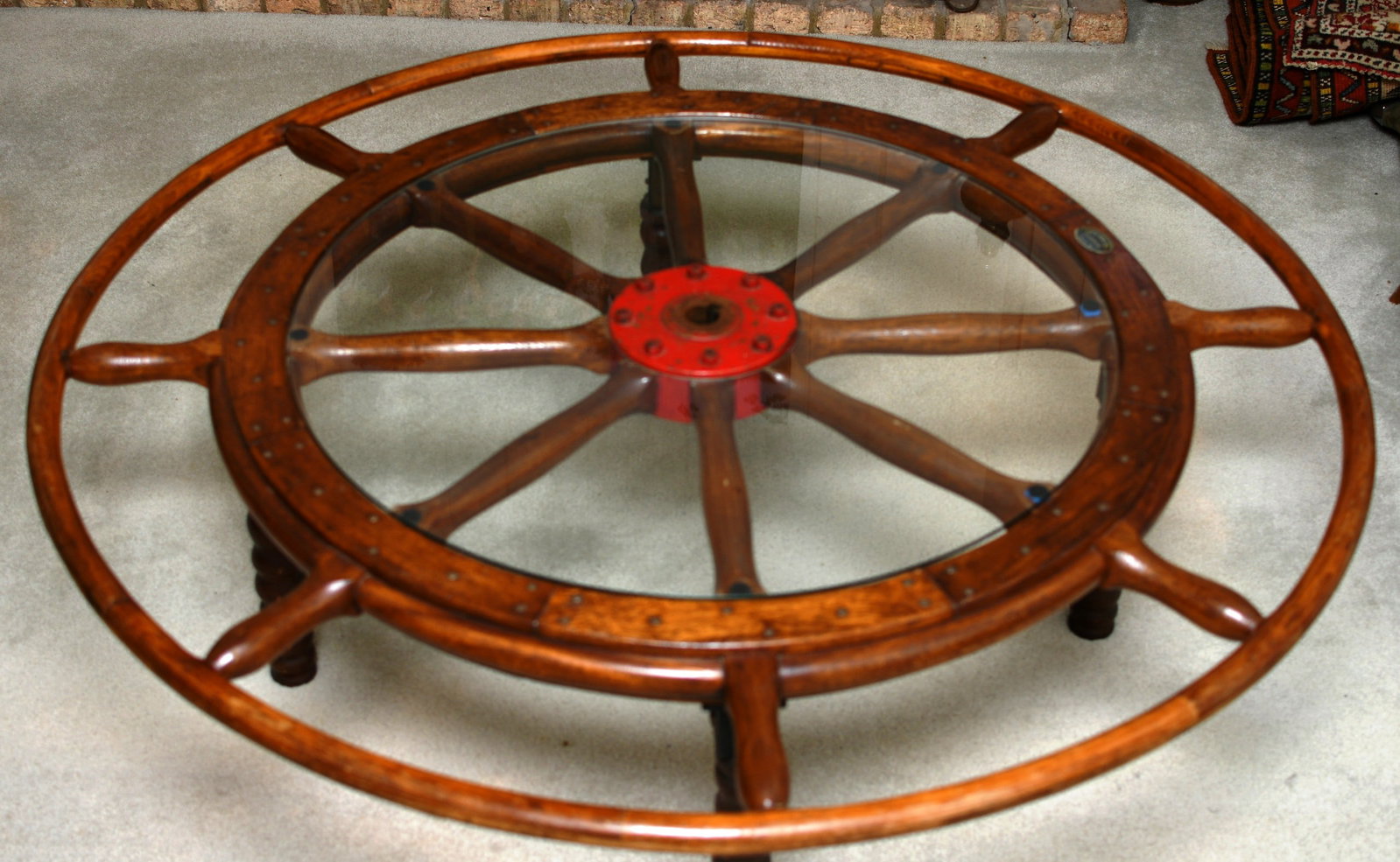 Large Ships Helm/Wheel: Heinrich Velner Sohne, Duisburg (Unterstr.38) with custom plate glass that fits around hub. This has been modified into a coffee table. READ OUR SHIPPING POLICY'S! This will be In person pick up or co