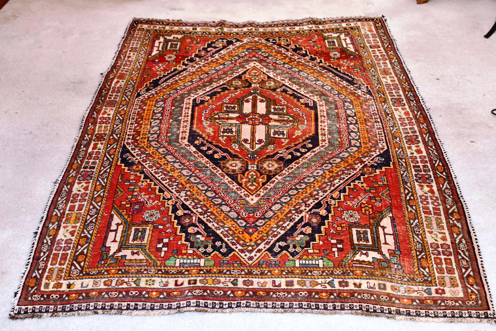 Oriental Rug: (see photos for stretched size change from end to end)92"x61"-57"