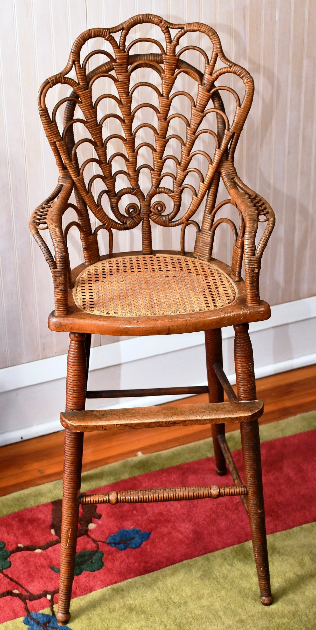 wicker youth chair: two back legs have been repaired, press caning seat. READ OUR SHIPPING POLICY'S! This will be In person pick up or contact UPS store in Kenosha, or your own shipper, the UPS store phone number is in o