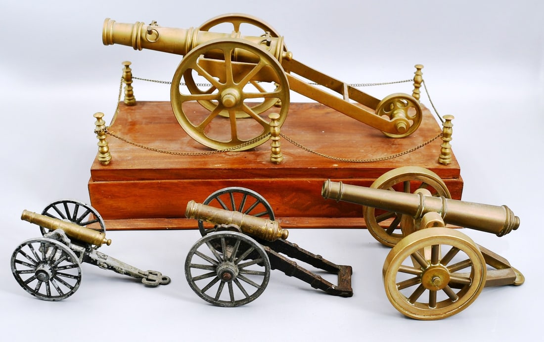 Replica cannons: 4 miniature replicas of different size and types of cannons. Note the length and weight of each individual cannon. (1 of 4)- Cannon display platform- 6 1/2"d x 12 1/2"w x 2"h. Cannon Barrel- 6". Heigh