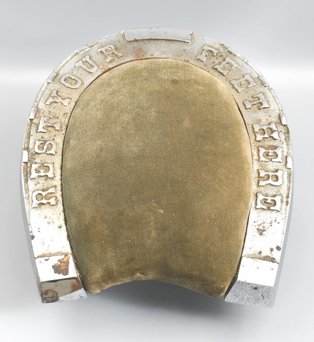Antique Nickle Plated Foot Rest: Antique nickel plated horse shoe shape foot rest. 12"L x 10"W horse shoe. Weight- 7lbs 9oz. Detail measures are Pad-9 1/2"L x 7"W. highest point-6 1/4". Lowest point-3 1/2".