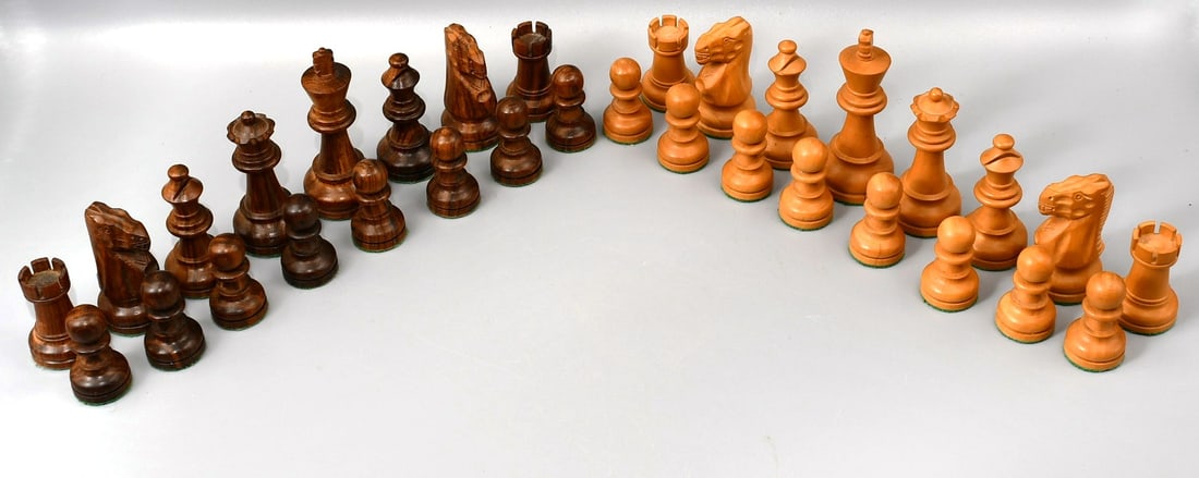 Wood chess set: 32 wood chess pieces with green felt bottoms . 2 species of wood. (NOTE-Weight and dimensions are before packaging) total weight- 2lbs 15oz. King height-3 3/4".
