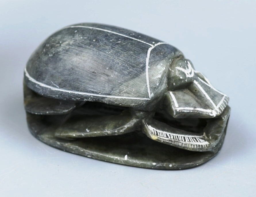 Soapstone Beetle Carving: Vintage Green soapstone Egyptian Scarab beetle carving. Has Egyptian writing on base of carving. base dimensions-3 3/4"L x 2 1/4"W. Beetle Height-approx. 2". (NOTE-Weight and dimensions are before pac