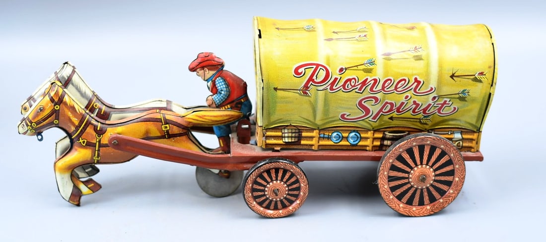 Pioneer Spirit Old West Wagon Toy: Pioneer old west wagon wind up toy. (NOTE-Weight and dimensions are before packaging) Overall Length-9 1/2". Overall height-4". Width-2 3/4". Weight- 5.8oz.