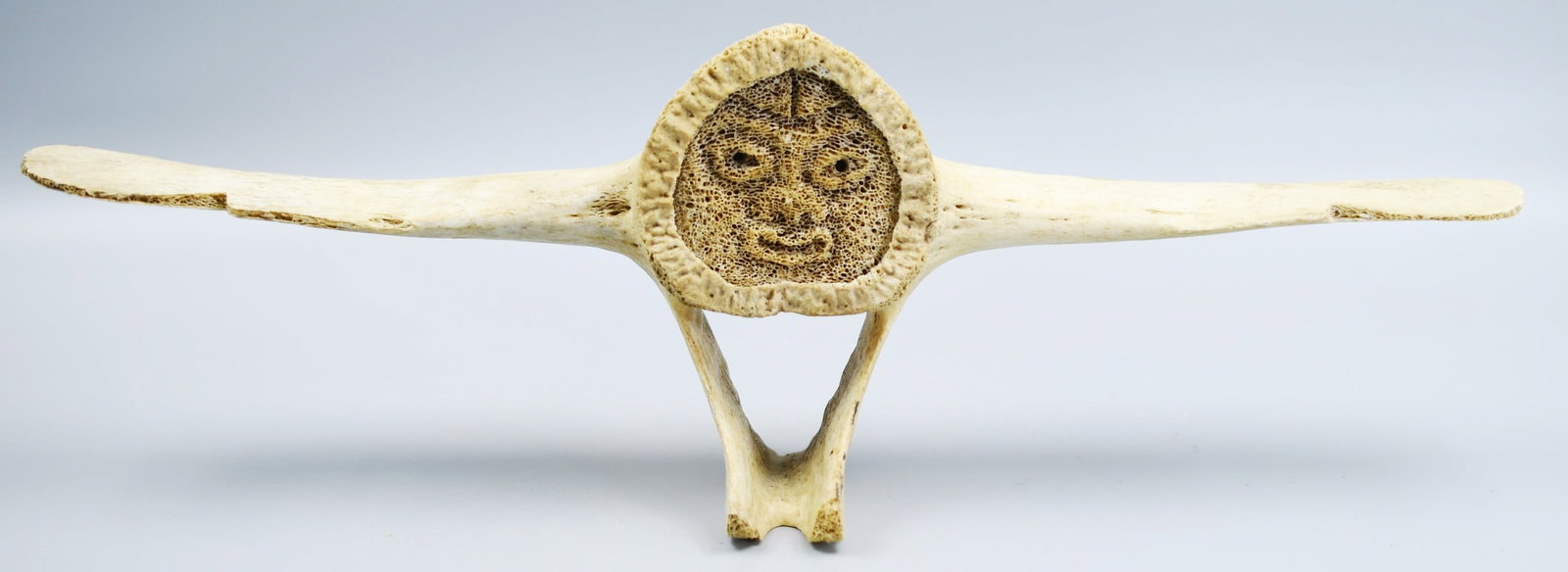 Inuit Art: Beached Whale vertebra art. (NOTE-Weight and dimensions are before packaging) Dimensions-15"L x 5"H x 3 1/4"W. weight- 8.5oz.