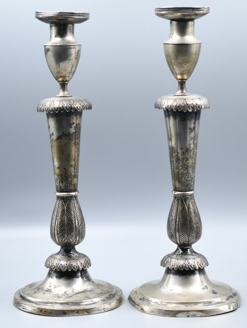 Silver Candlesticks.: 2 Silver Candle sticks. We are unsure if hey are silver or plated, the Base has 2 eagle stamps. Candle holder on the top is removable. (NOTE-Weight and dimensions are before packaging) Base Dia-4 3/4"