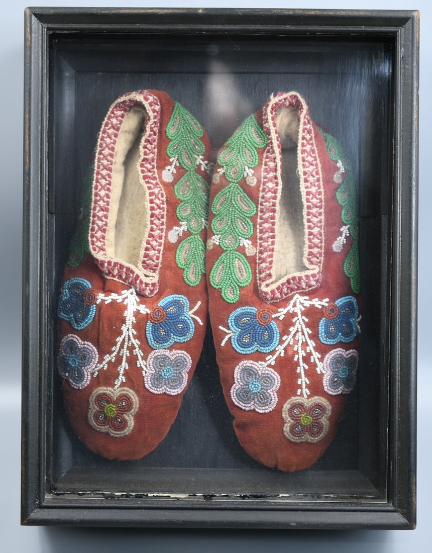 Native American Moccasins: Native American moccasins in a shadow box with corn maidens on the side. (NOTE-Weight and dimensions are before packaging) Shadow Box Dimensions-9 3/4" x 12 3/4" x 4". Total weight-2lbs 6.25oz.