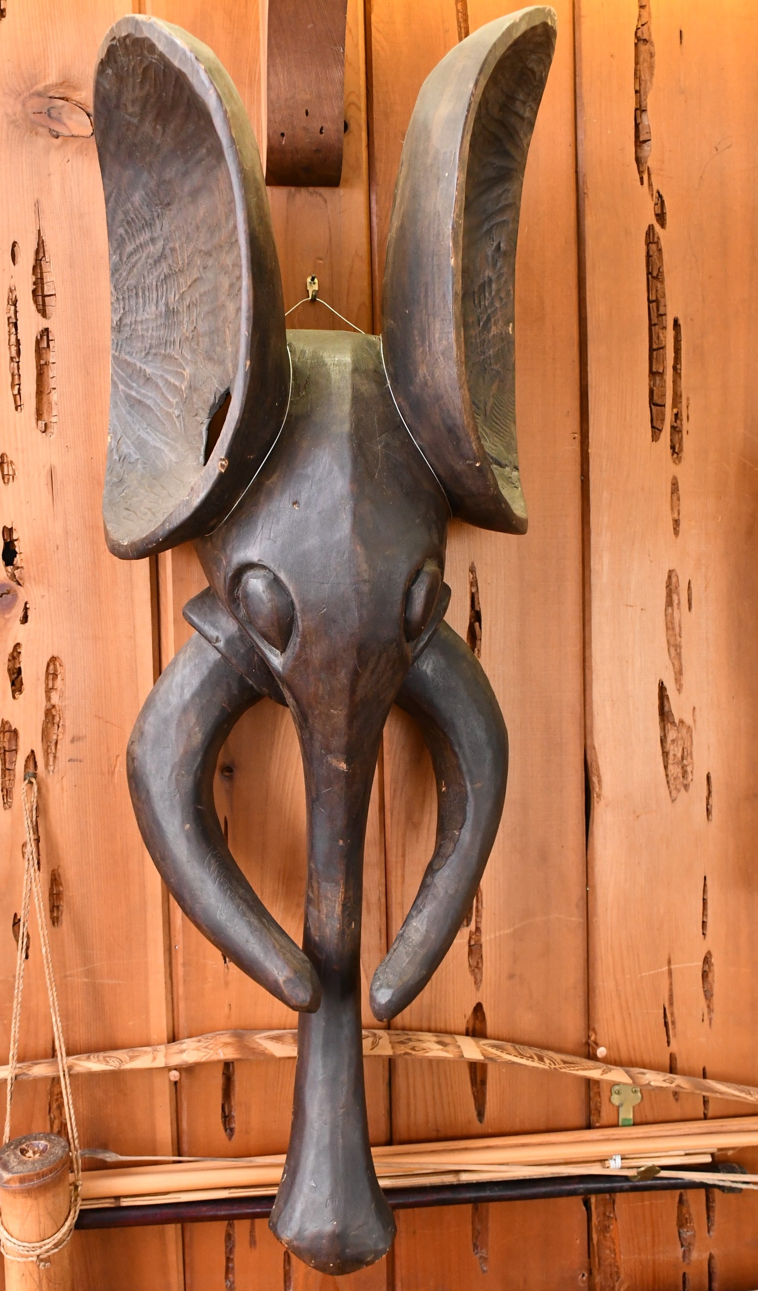 Elephant Mask: (This will ship through the UPS Store in Stoughton WI) African wood Elephant Mask from the grassy region. Considerable age carved wood tribal mask. Dr Herz collected quality tribal pieces from around 