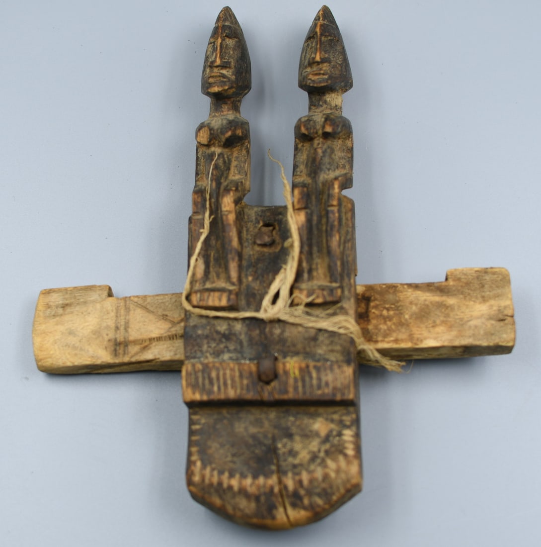 Dogon Tribal Door lock: African tribal granary Dogon door lock. Wood carved. (NOTE-Weight and dimensions are before packaging) 10 1/2" x 8 3/4" x 1 1/2". Weight-12oz.