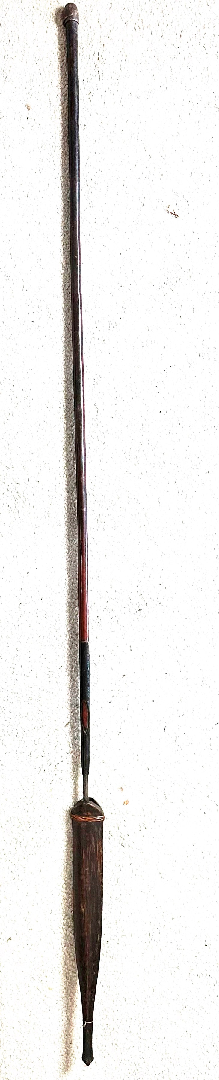 African Spear: African Spear with Sheath, Possibly Zulu . (This ships through the UPS store in Stoughton, WI) Spear length-57 1/4". Handle-5/8" dia. Total length-62 1/2". Total weight-1 lb. 2oz. (NOTE-Weight and dim