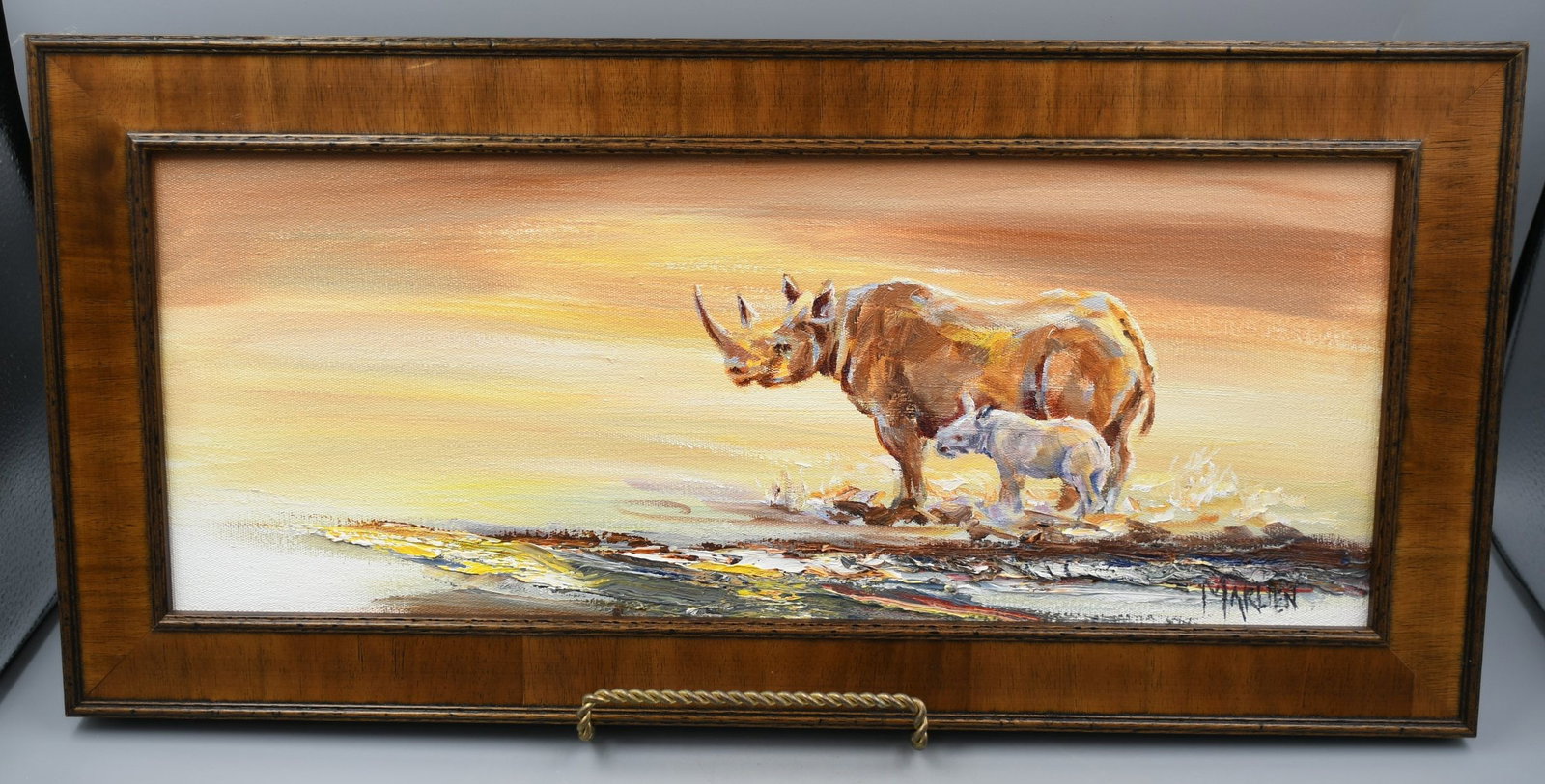 Rhino Oil Painting: Framed Oil painting of a Rhinoceros and baby rhinoceros, Artist signature- Marlien. (This ships through the UPS store in Stoughton, WI) READ OUR SHIPPING POLICY'S! frame-22 5/8" x 10 7/8" x 1". (NOTE-
