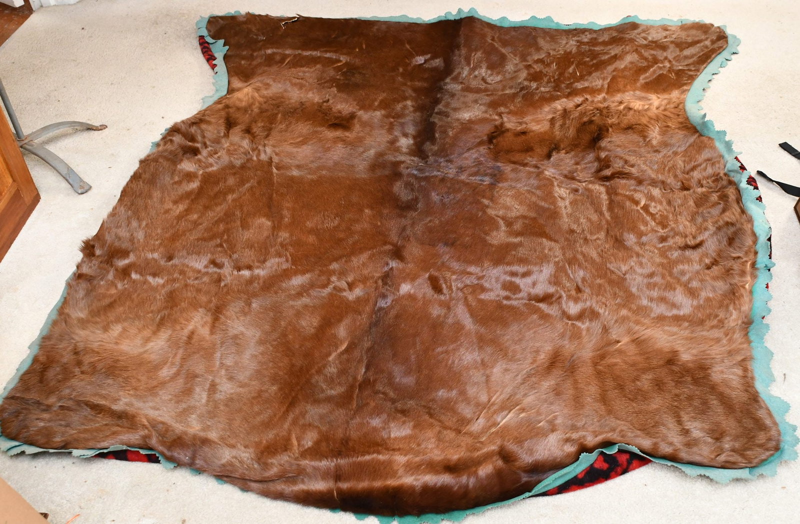 Horse Hide Lap Robe: Horse Hide lap robe made by National Fur and Tanning Co. Omaha, Nebraska. (NOTE-Weight and dimensions are before packaging) Dimensions-69" x 60".