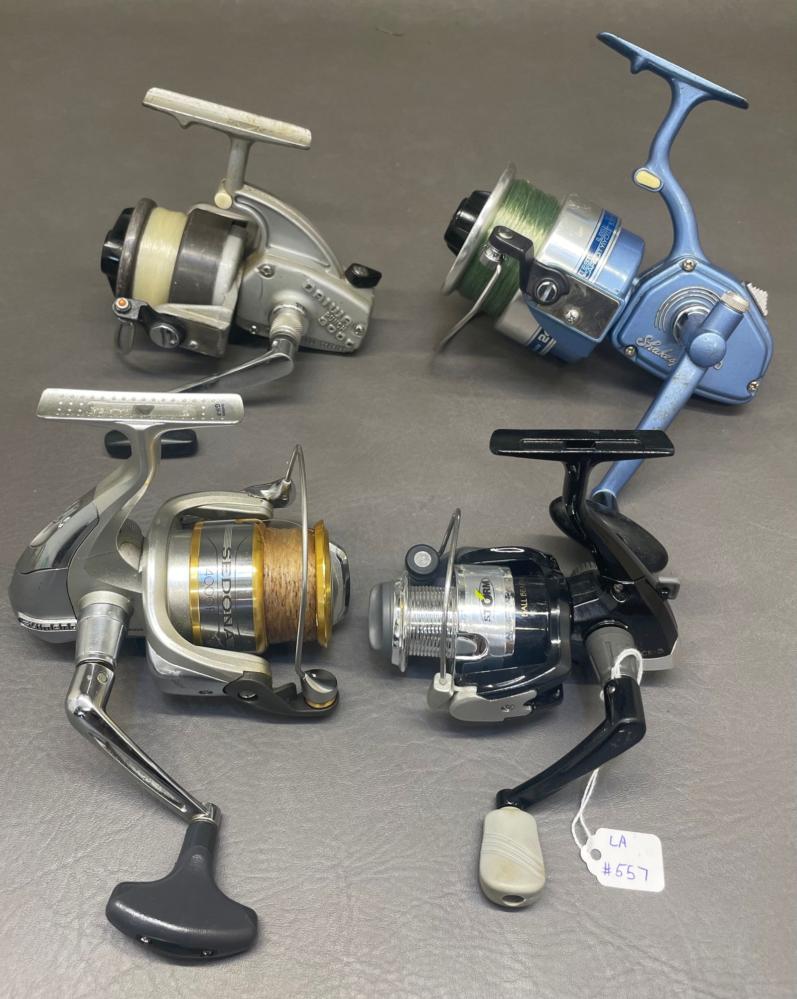 4 Spinning Reels: 1 Sedona 4000FD, 1 Storm TSSCK-3, 1 Vintage Daiwa Punch 3000 (made in Japan), 1 Vintage Shakespeare 2450 (Made in Japan)