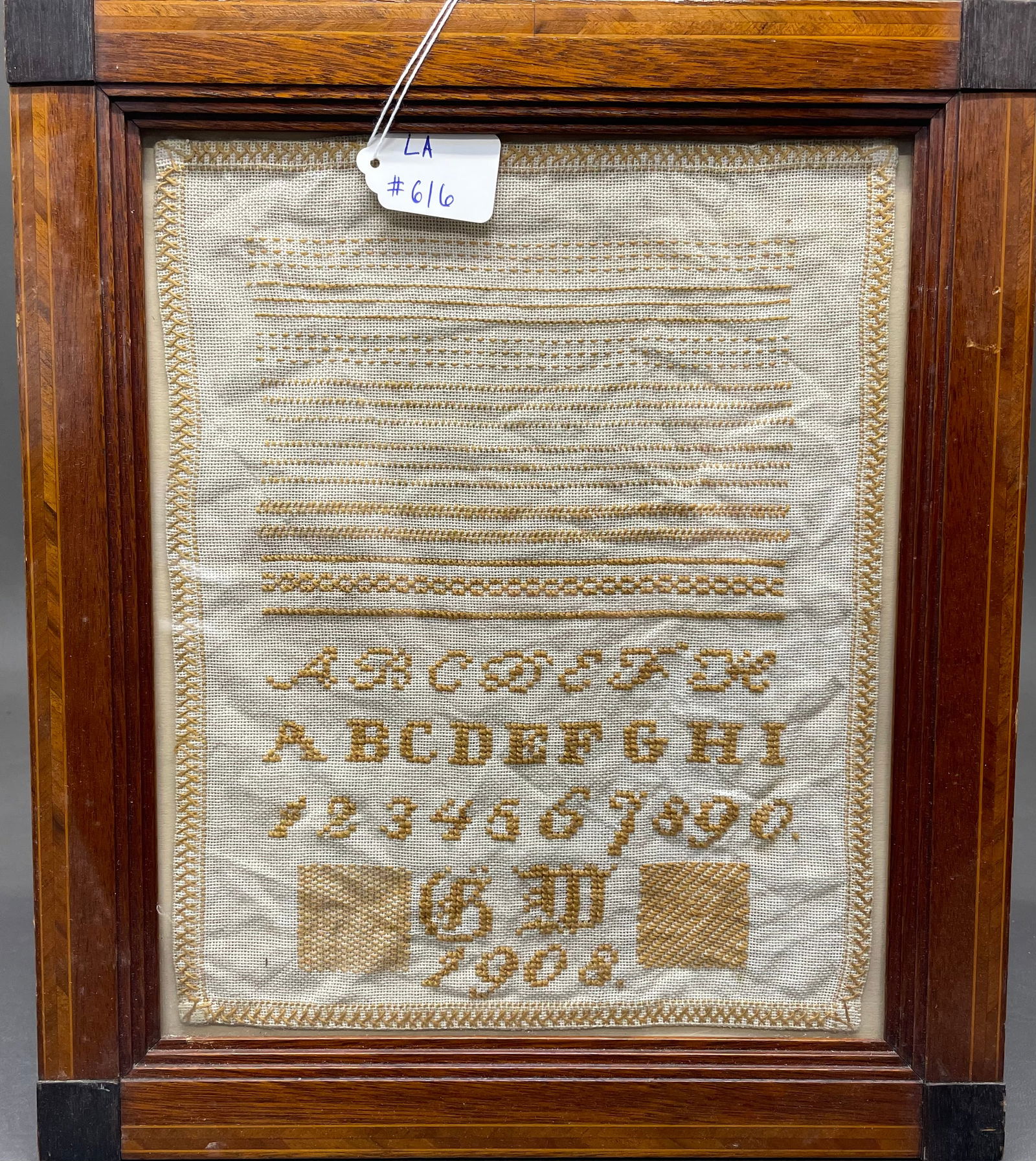 Antique Sampler: Antique Framed sampler from 1908. Sampler-11 1/2" x 9 1/2". Frame-14 1/2"x 12 1/2". All framed art will be shipped through the Stoughton, WI UPS store.