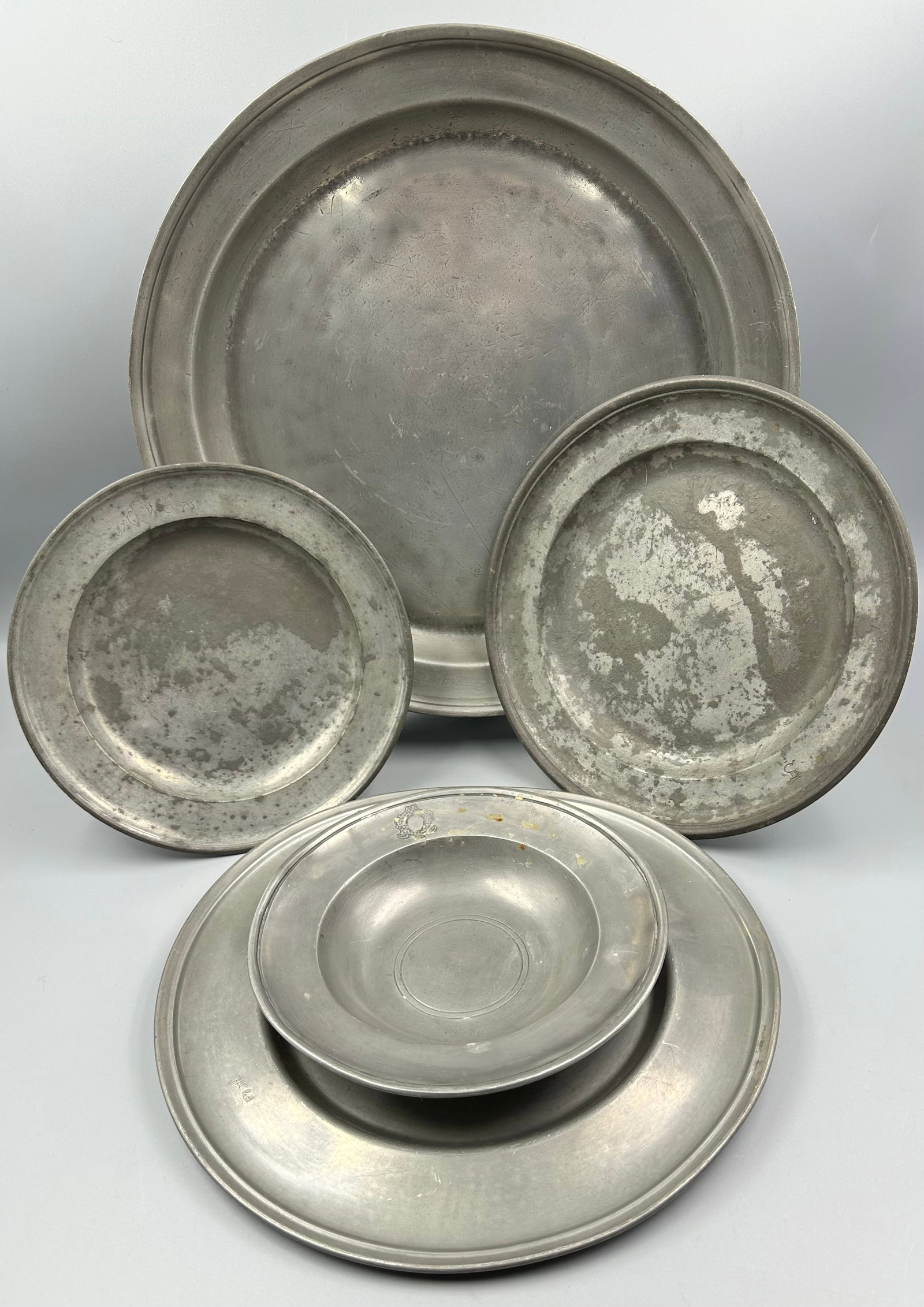 5 Pewter Plates: Antique pewter plates ranging from 13-1/2" diameter to 7-1/2" diameter, please see photos for hallmarks.