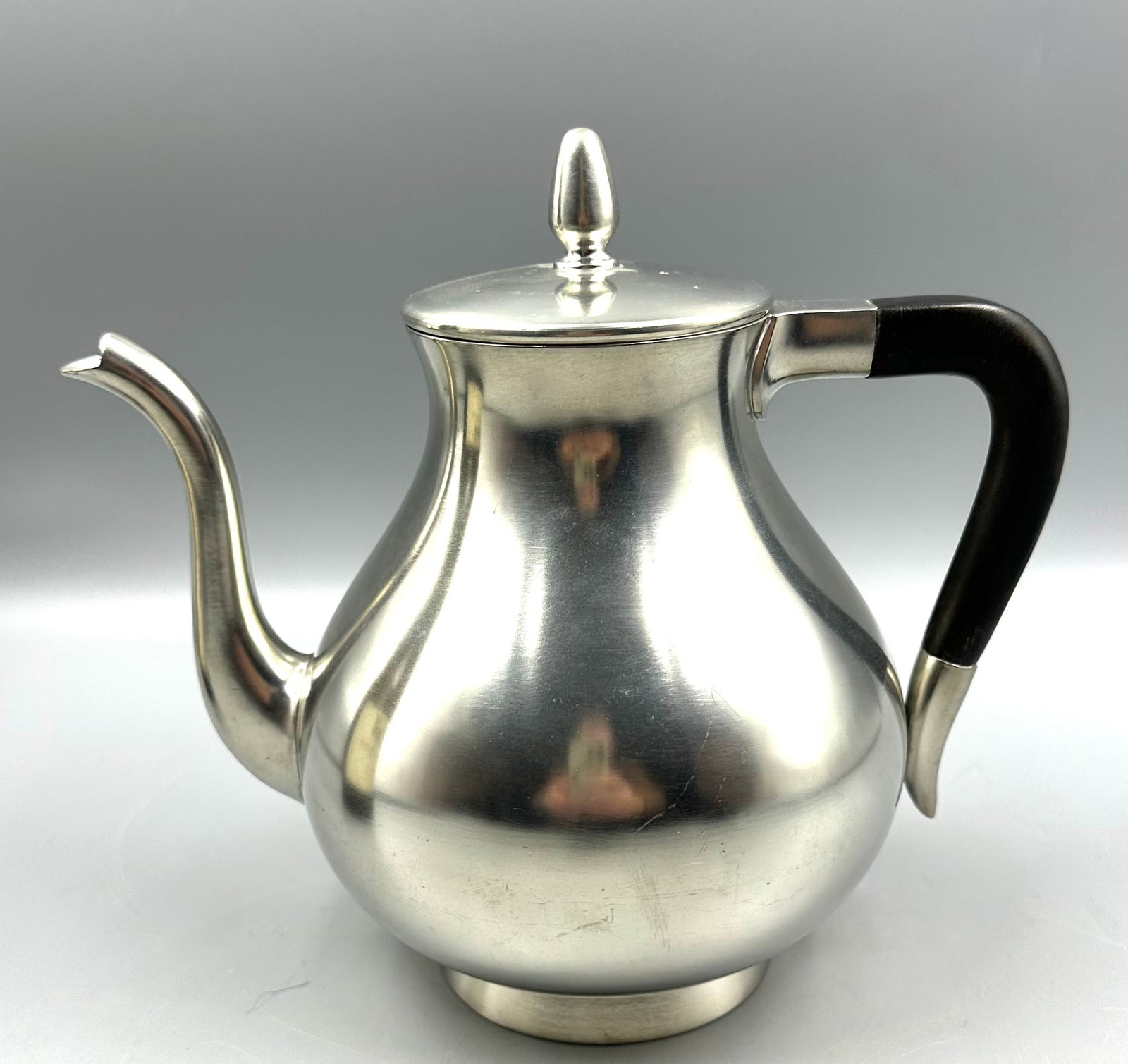 Royal Holland Pewter Tea Pot: This tea pot is quality & unused with paper work, it's about 7-1/2" tall with a wwood handle