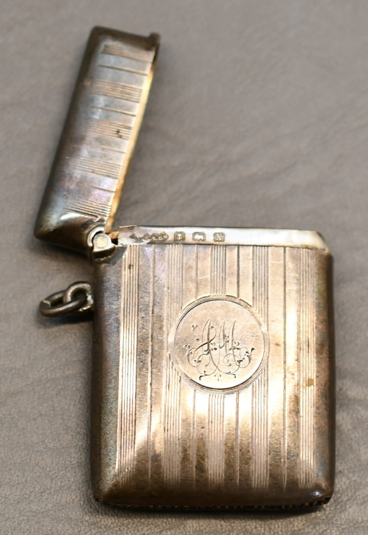 Silver Match Case: Please see the hallmarks in the photos for identification indicating sterling from Birmingham. This has a spring loaded lid holding it tightly closed and striking bottom, it has a monogram AM and a lo