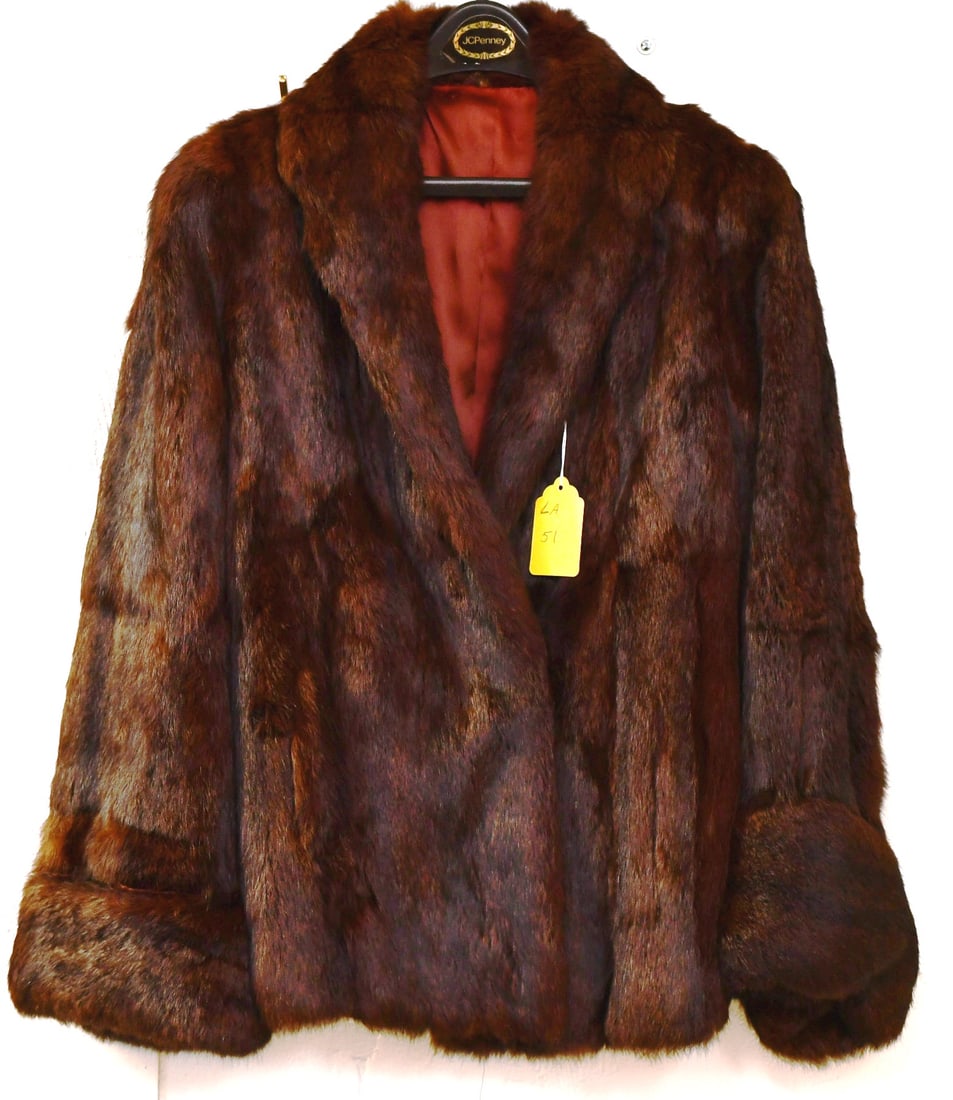 Vintage Woman's Mink Coat: This coat is 28 long, 31 neck to cuff, 14.5 arm hole to arm hole, 19 arm pit to arm pit. There are 3 hook & loops for buttoning. Dimensions given are for the item(s) & weight is with the packaging.